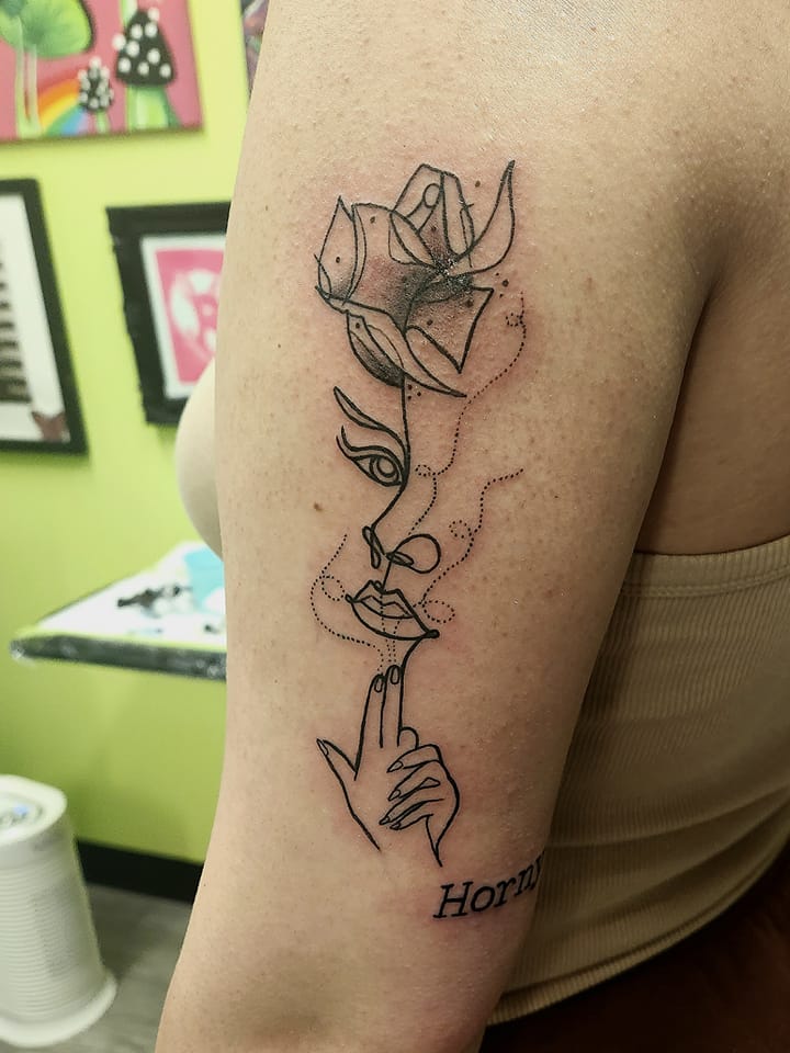 face line work tattoo by nicole at tantrix body art