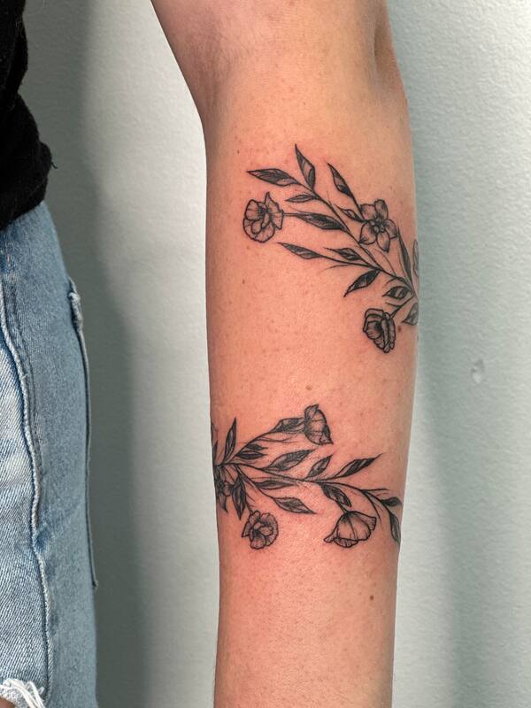 Floral Wrap Around Tattoo by Haley at Tantrix Body Art