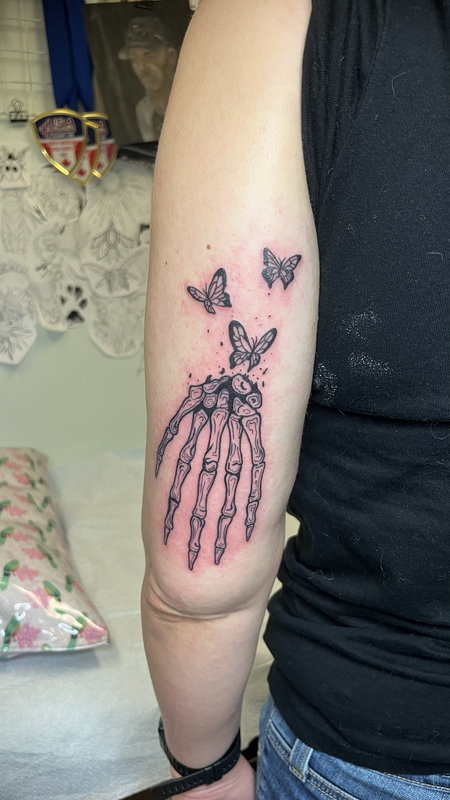 skull and butterfly tattoo by bella at tantrix body art