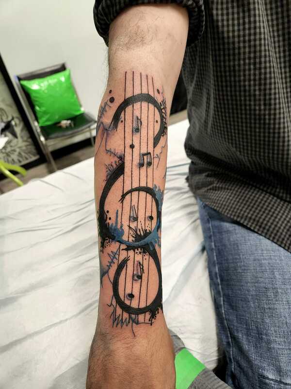 musical tattoo by nicole at tantrix body art