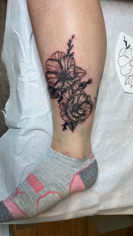 floral leg tattoo