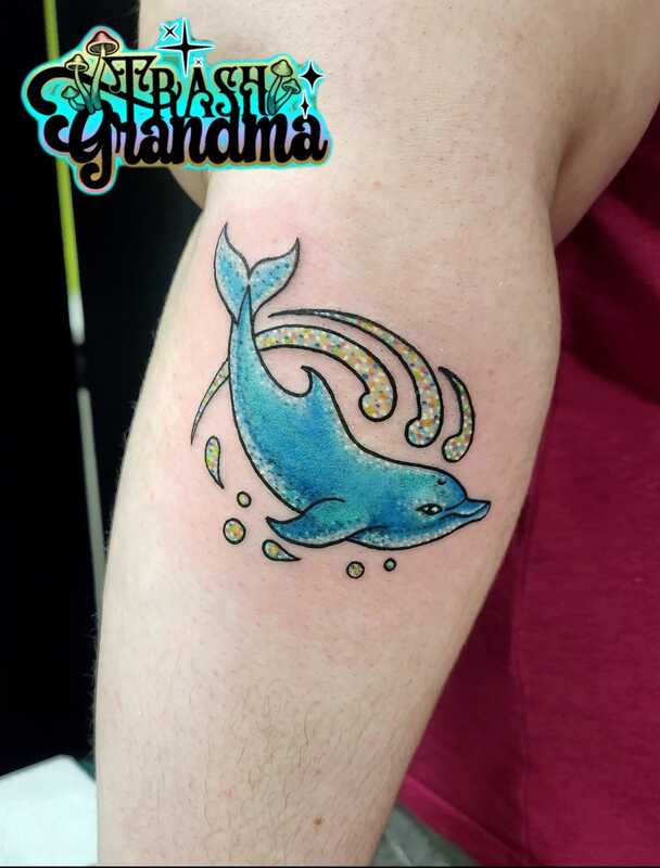 sparkle dolphin tattoo by nicole at tantrix bodyart 