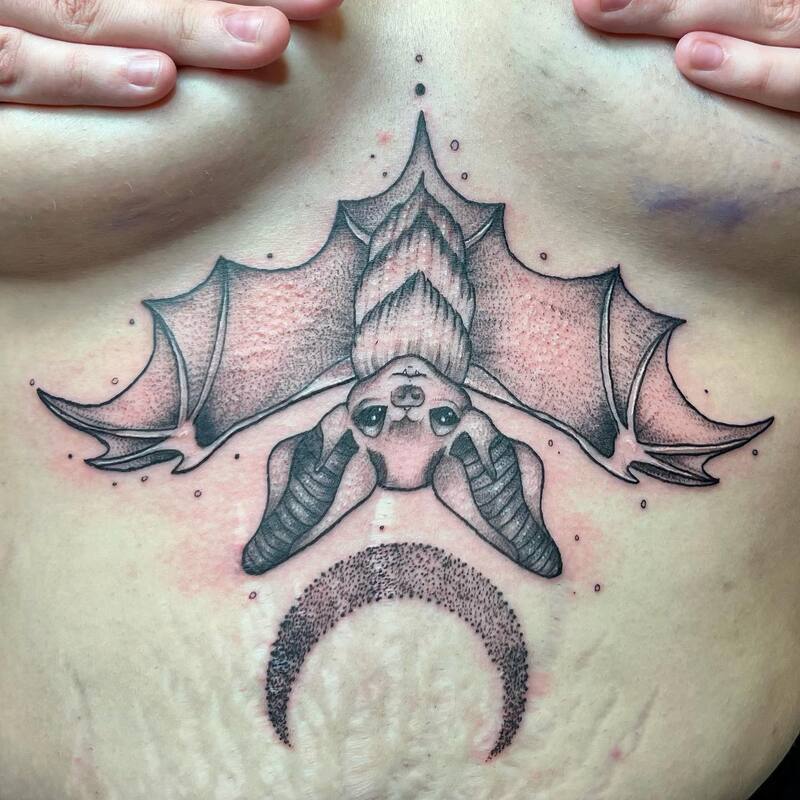 bat sternum tattoo