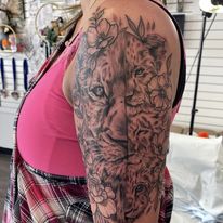 lion and cubs tattoo by bella at tantrix body art