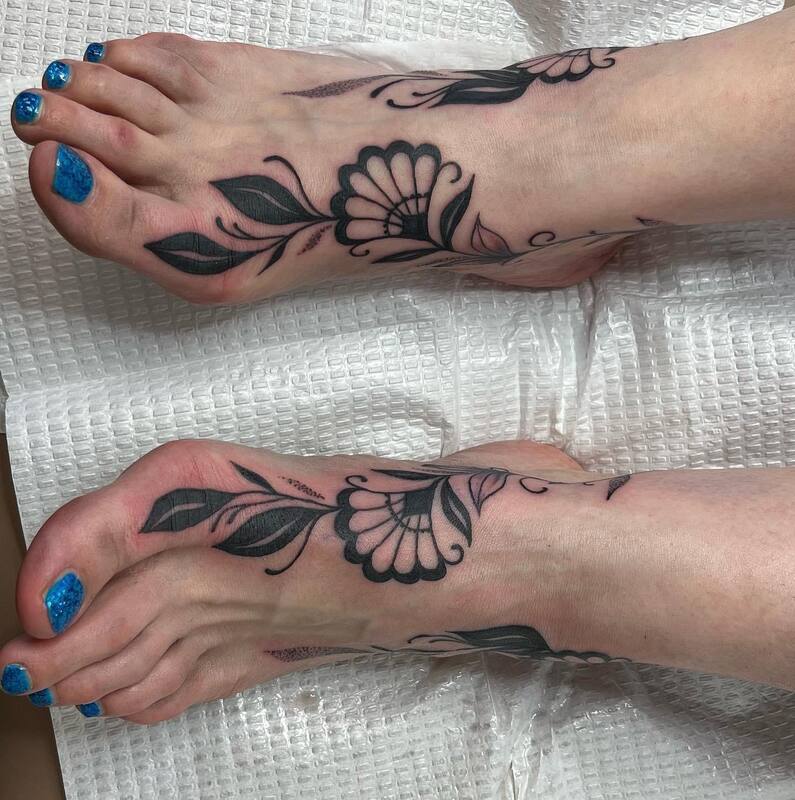 feet tattoos by Bella Thompson hill