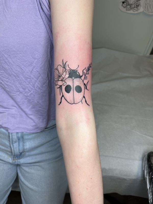 lady bug tattoo by bella at tantrix body art